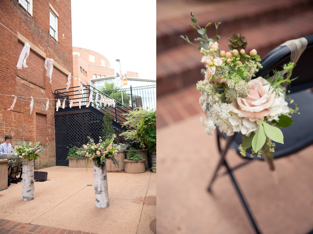 Larkins Wedding Courtyard Decorations - flowers & pink tassels
