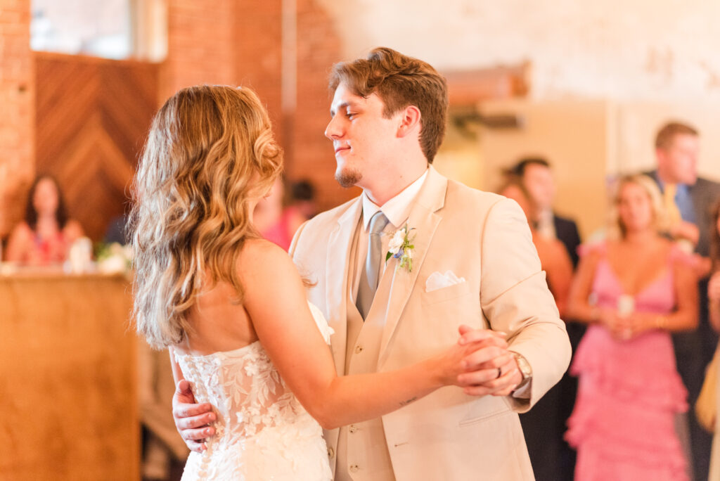 A bride and groom share a dance at the bleckley inn